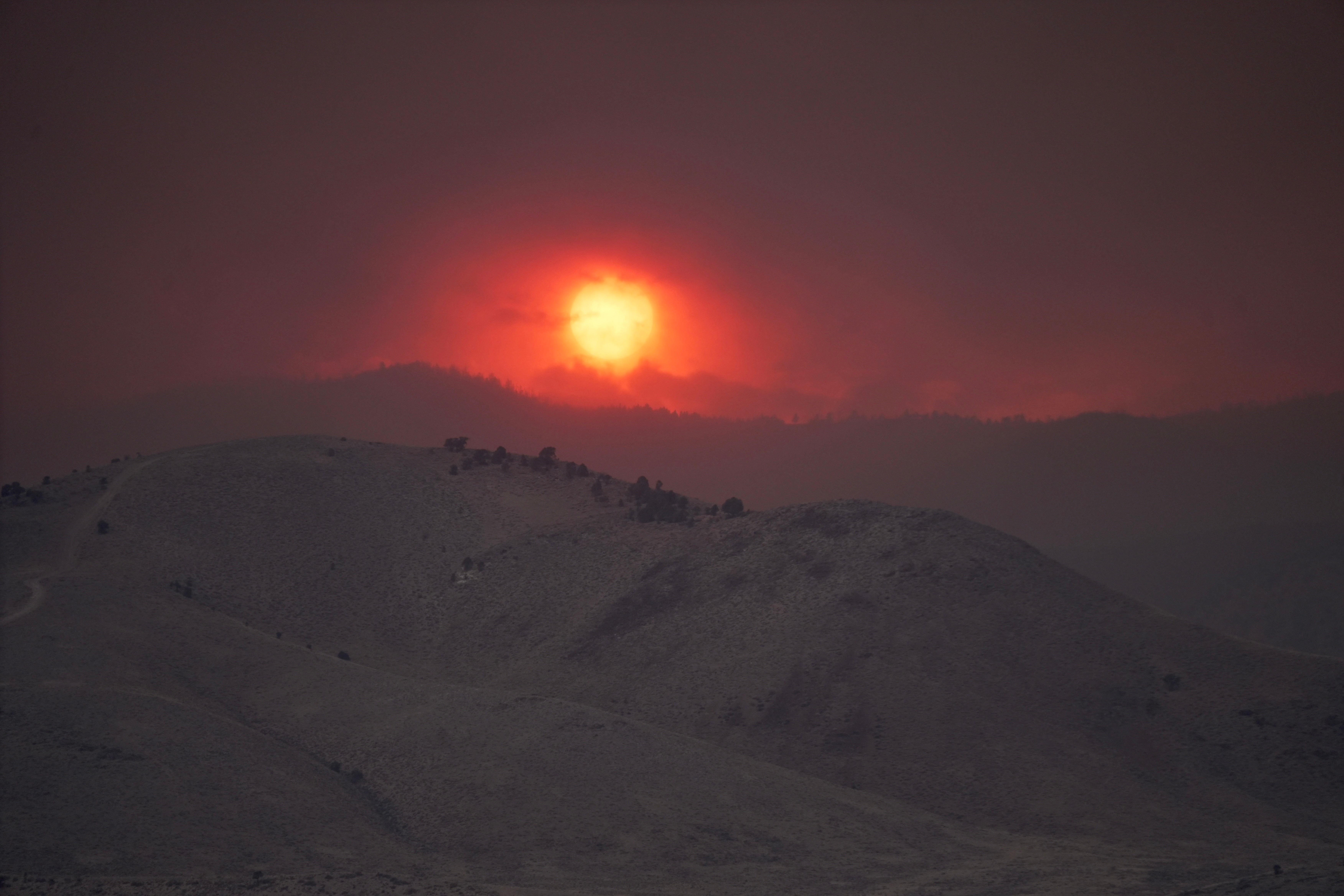 Critical fire weather complicates firefighting efforts in massive Utah wildfire